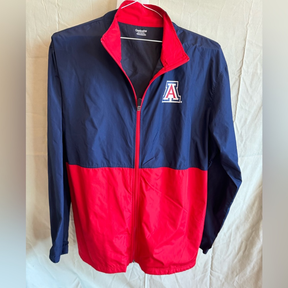 U of A Wildcat windbreaker, brand new, size XL